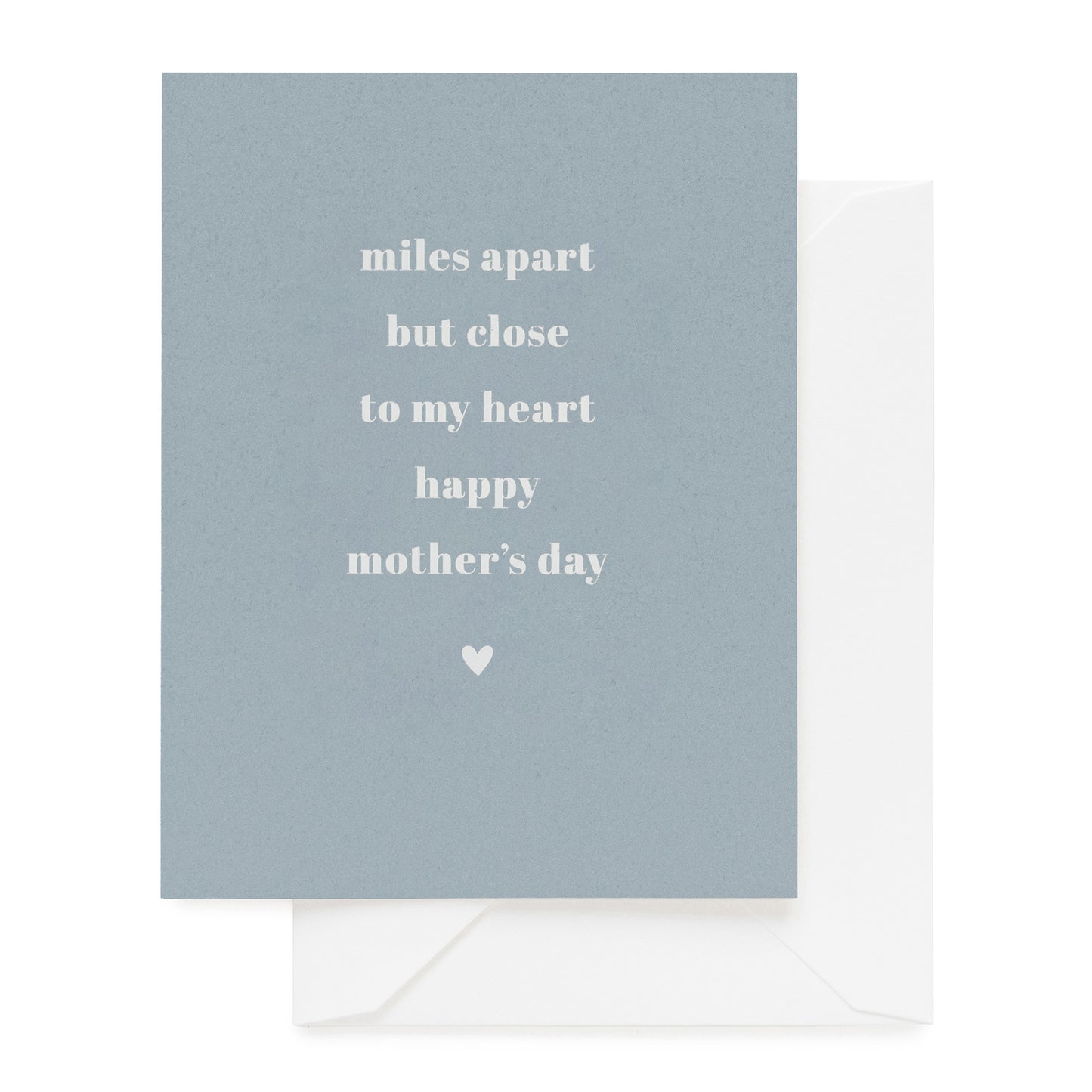 slate blue card foil printed with miles apart but close to my heart happy mother's day paired with a white envelope