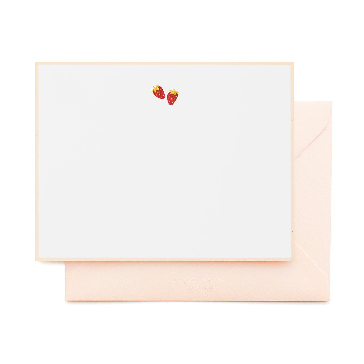 white card with red and gold strawberries, pale pink border, and pale pink envelope