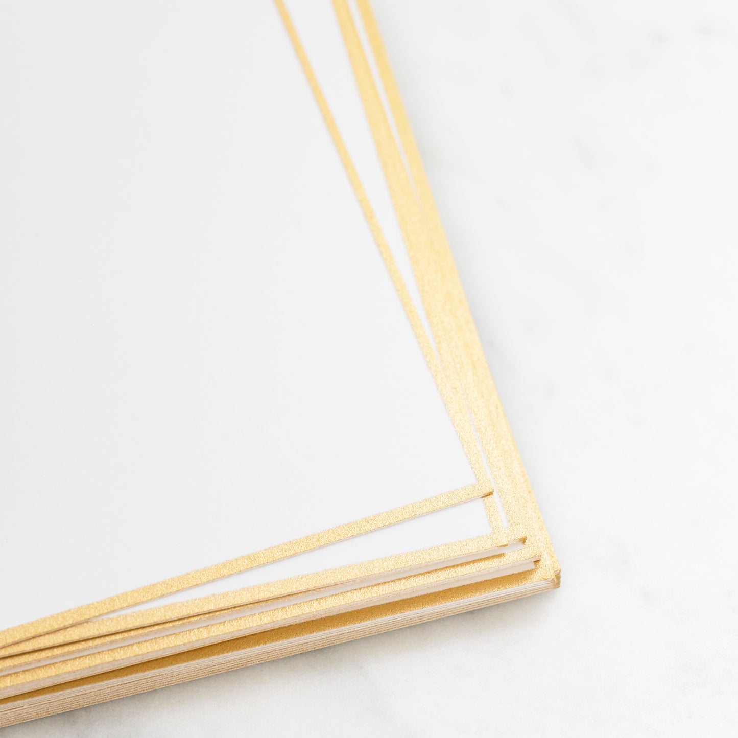Stack of gold hand painted borders
