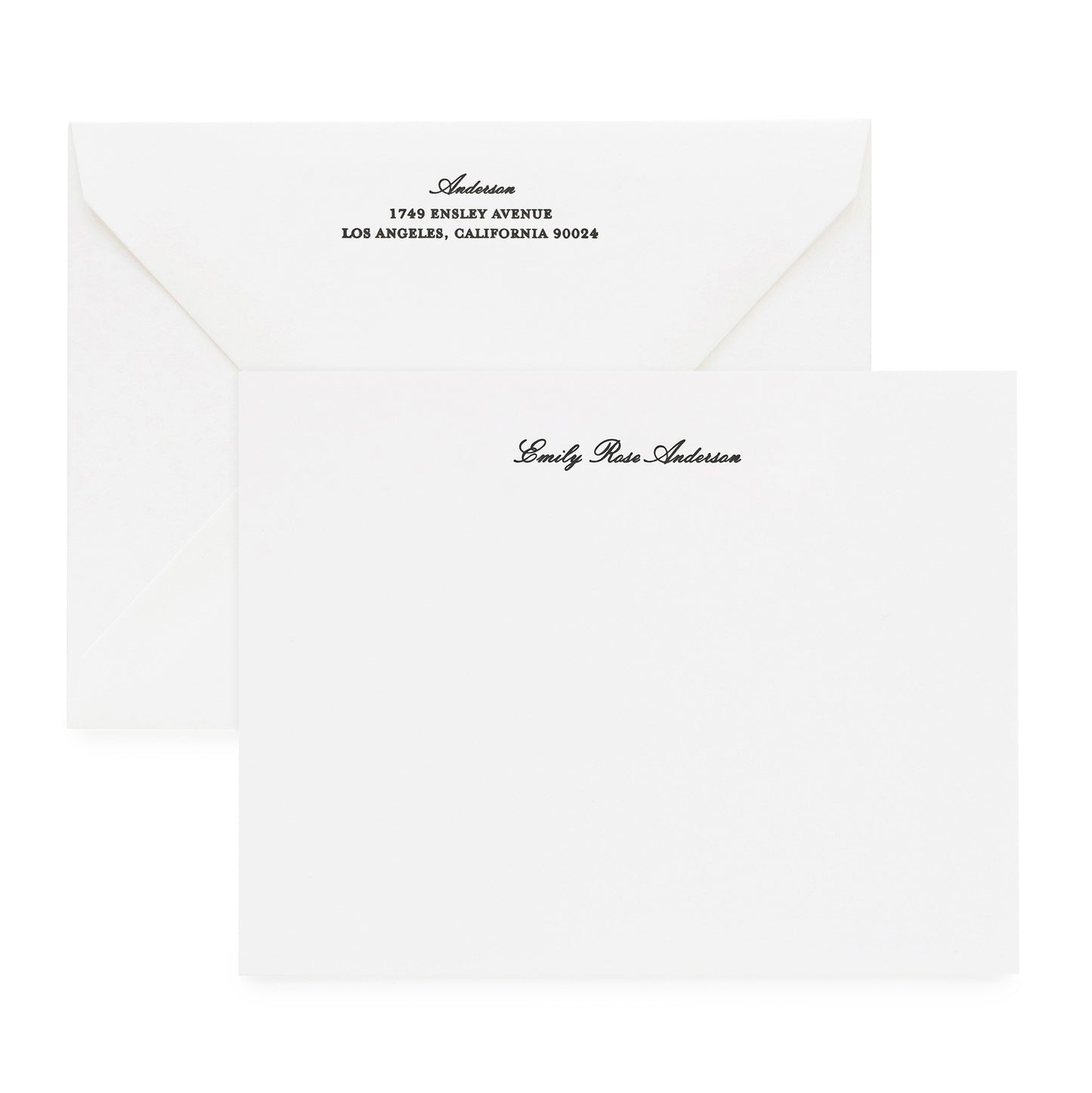 white custom stationery flat notecard with black letterpress ink with a name printed in formal script font