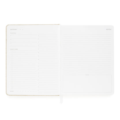 Daily layout of daily planner with today's priorities, tasks, and notes