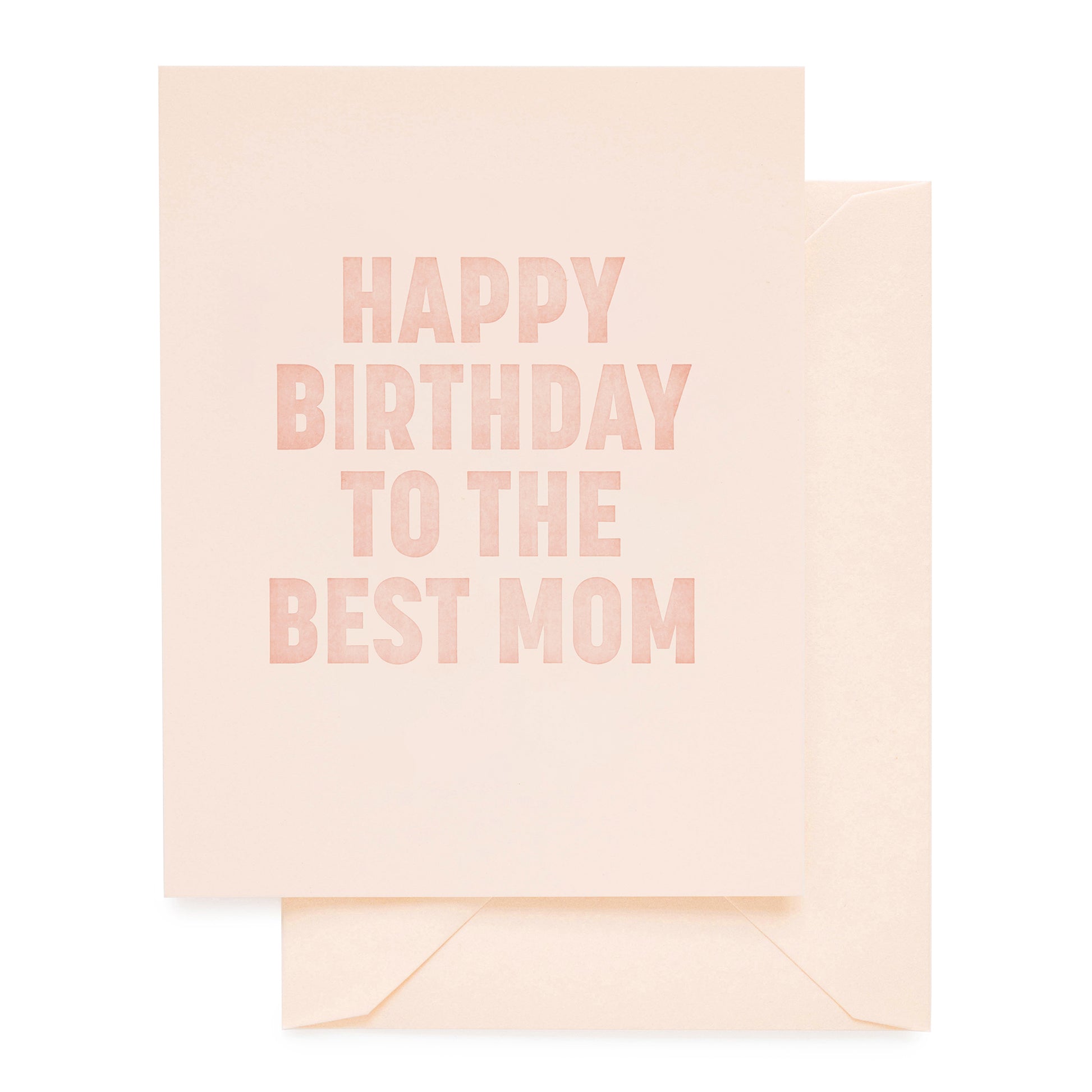 Pale pink card with pink ink printed with 'happy birthday to the best mom' paired with a pink envelope
