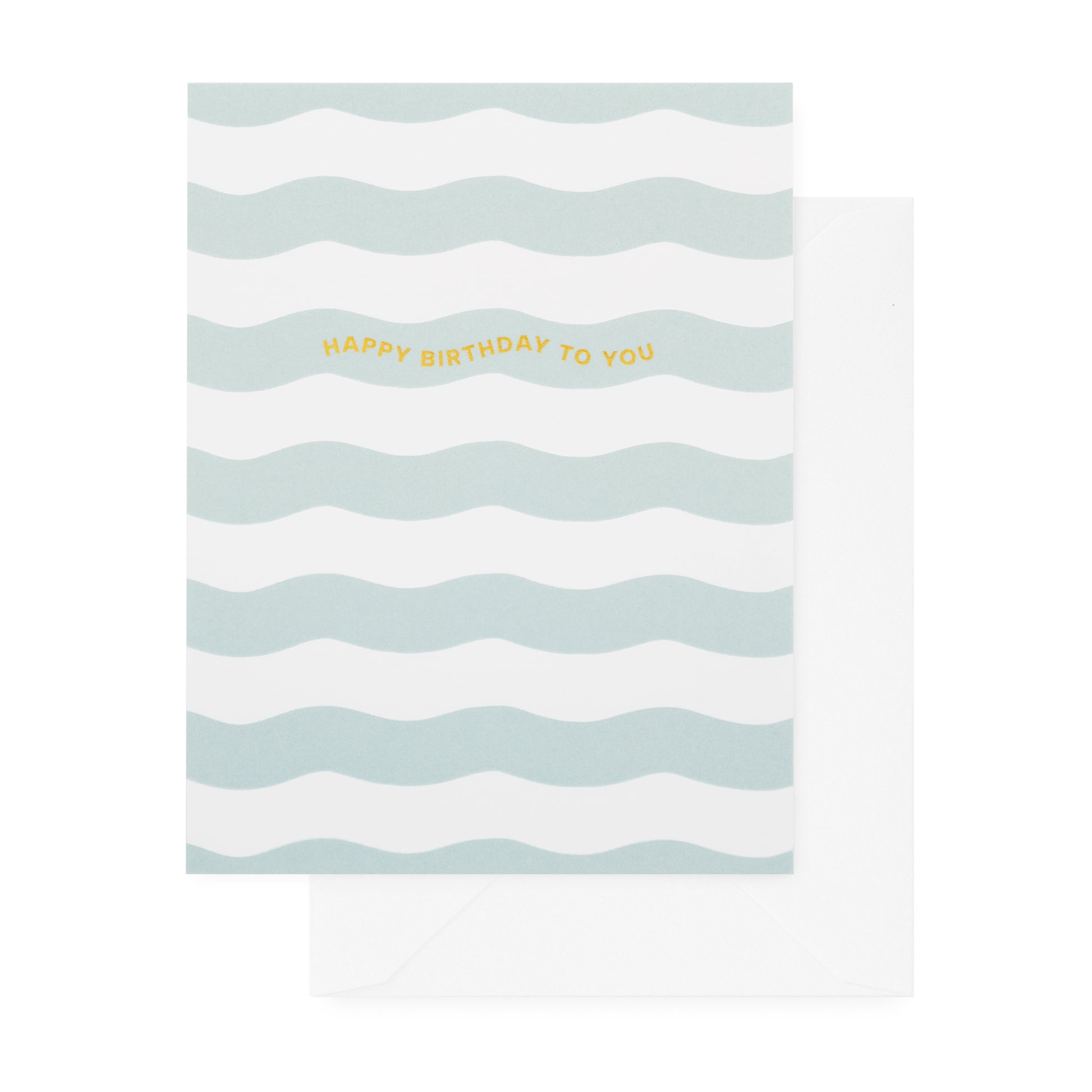 Greeting card with wavy lines and 'Happy Birthday to You' text on a light blue background paired with a white envelope