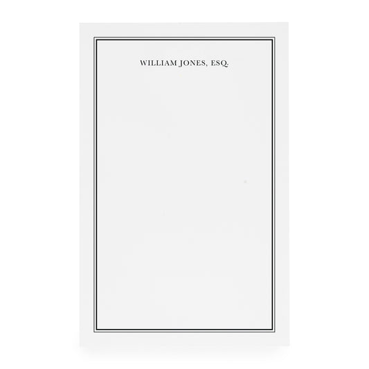 White custom notepad with black border and 'william jones, esq' printed