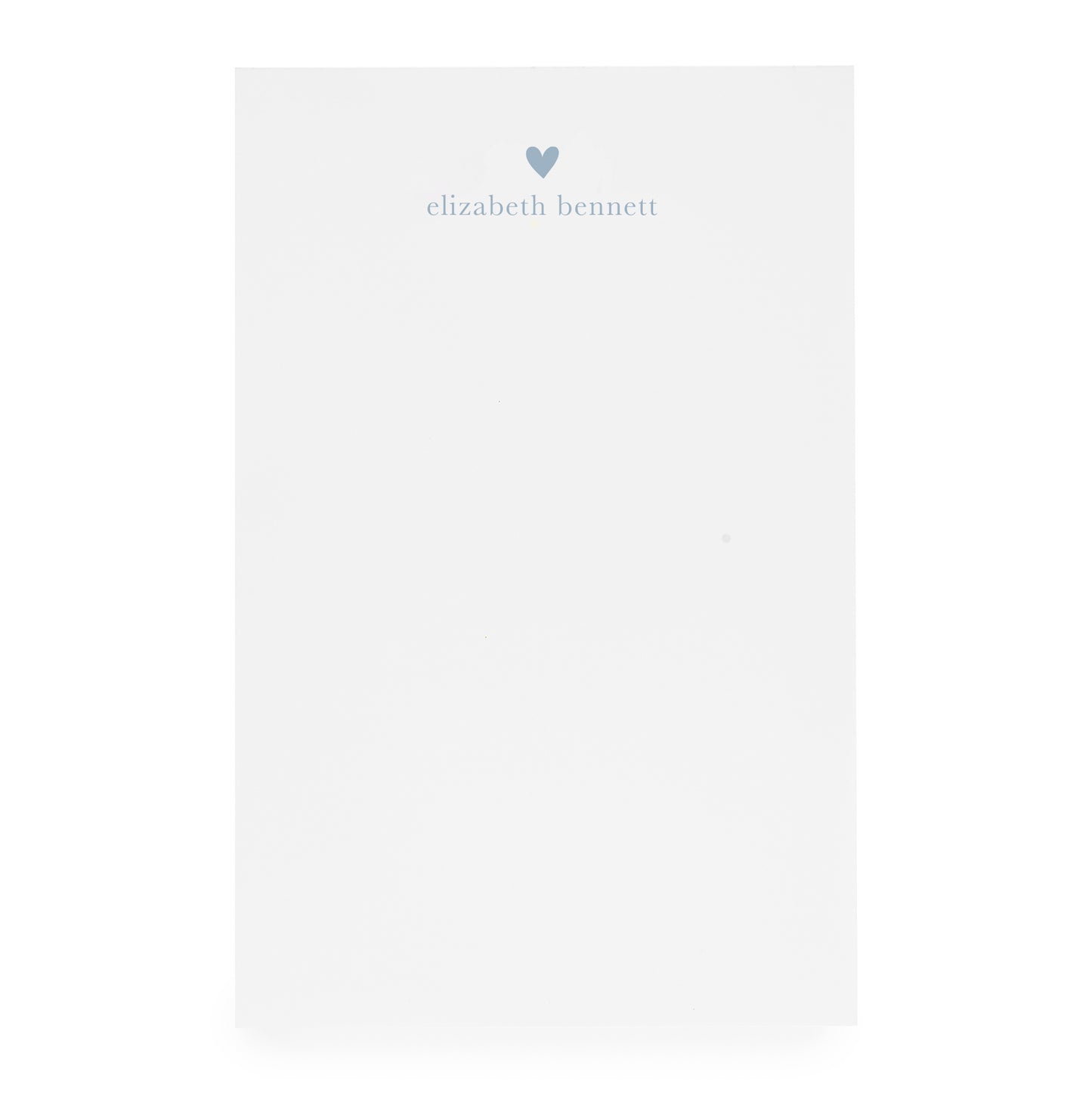 White notepad with heart and "elizabeth bennett" in blue