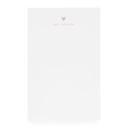 White notepad with heart and "mrs. johnson" printed in pink