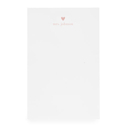 White notepad with heart and "mrs. johnson" printed in pink