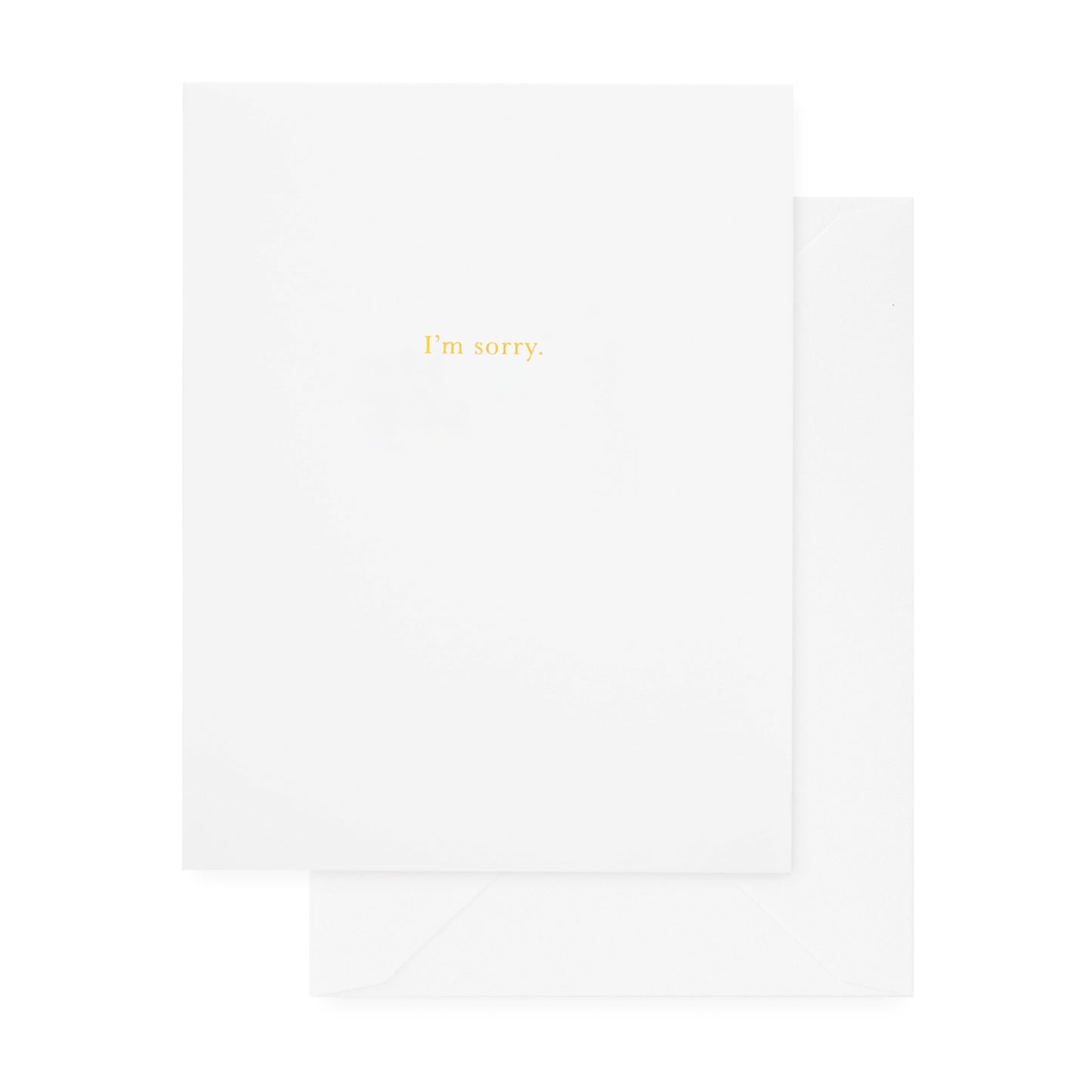 White card with "i'm sorry" in gold foil paired with a white envelope