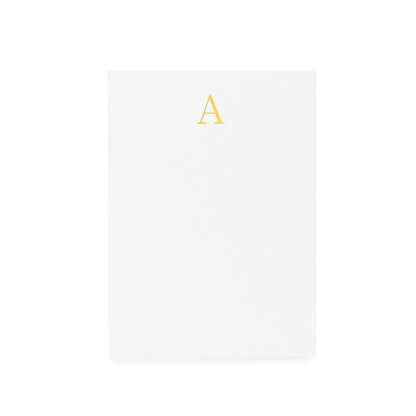 Mini white notepad with a gold foil 'A' on it