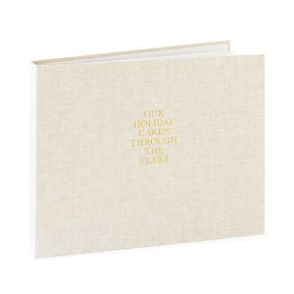 Flax fabric bound keepsake book with gold foil 'our holiday cards through the years' on cover
