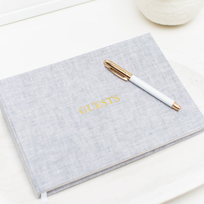 Grey guestbook cover foil stamped with guests