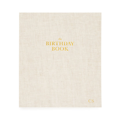 Birthday Book in flax foil stamped in gold with the birthday book and personalized initials