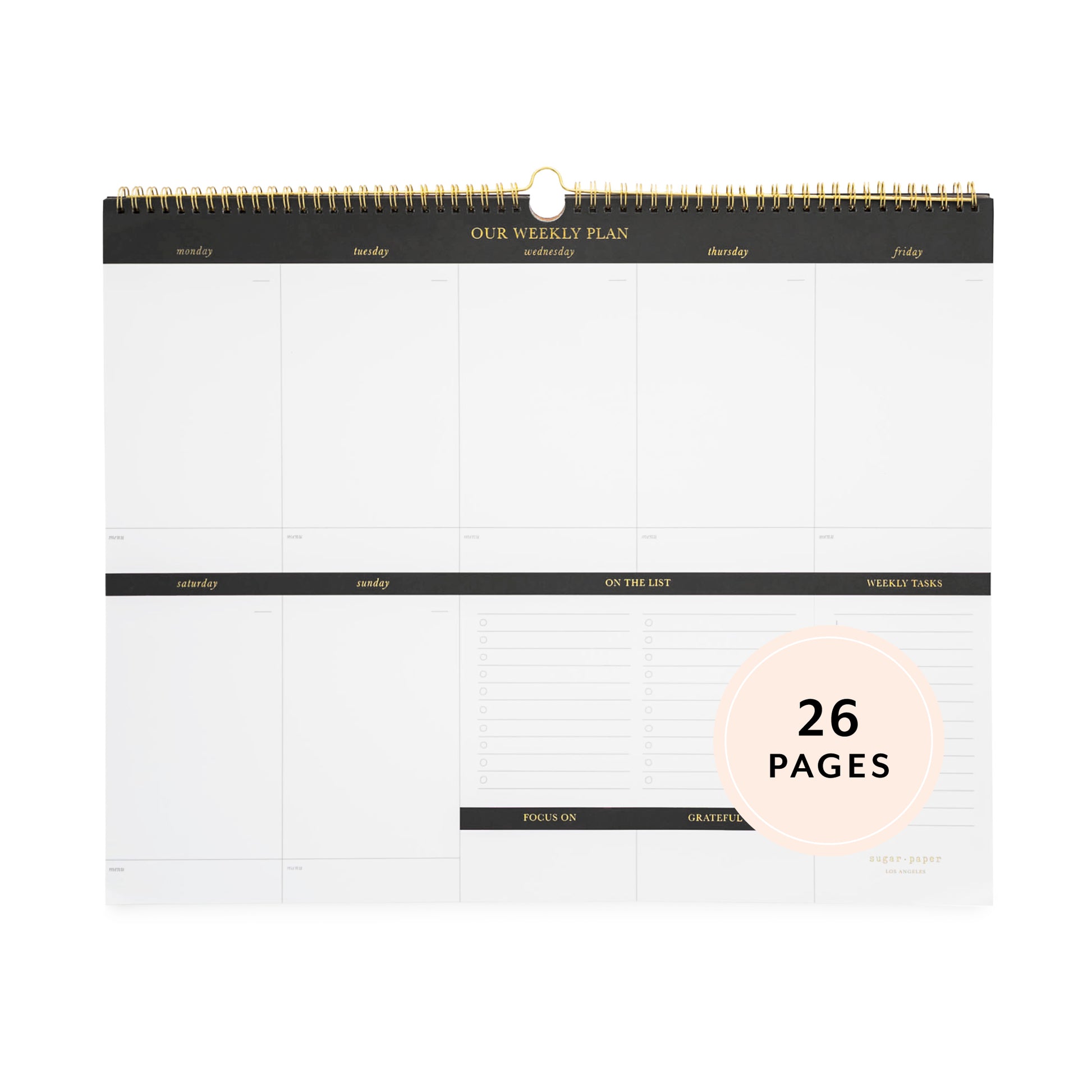 large oversized black with gold spiral planning pad with black and gold printed with days of the week, on the list, weekly tasks, focus on and grateful for sections