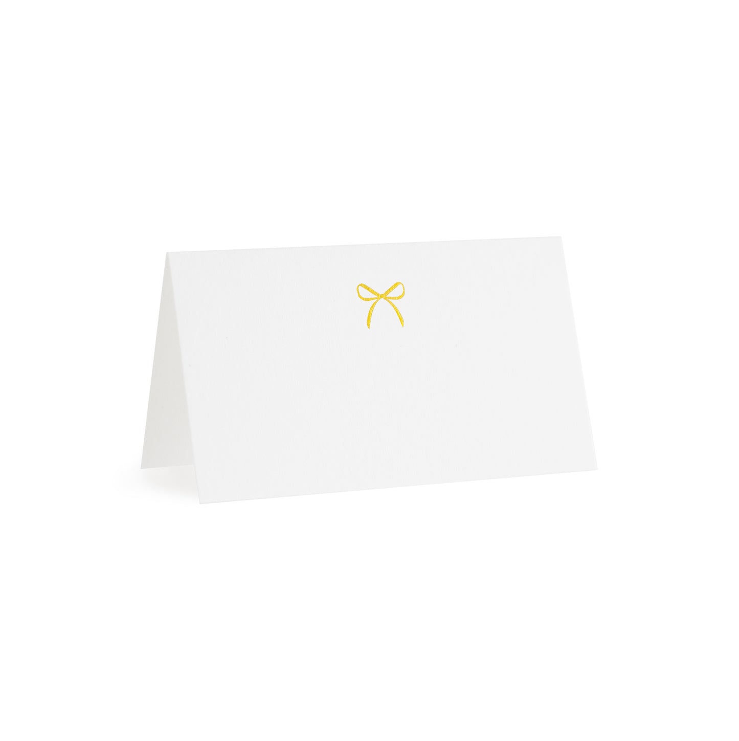 white tented place card with gold bow
