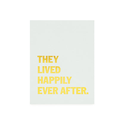 Pale blue card foil printed with 'they lived happily ever after' in gold foil