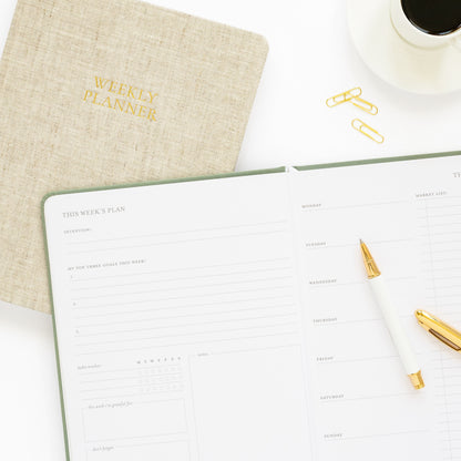 Cover and interior of weekly planner with this week's plan spread