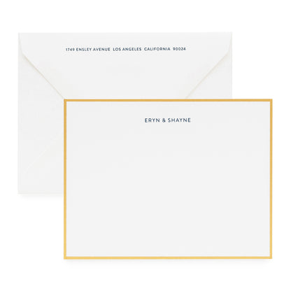 Navy blue eryn and shayne custom stationery with a gold border