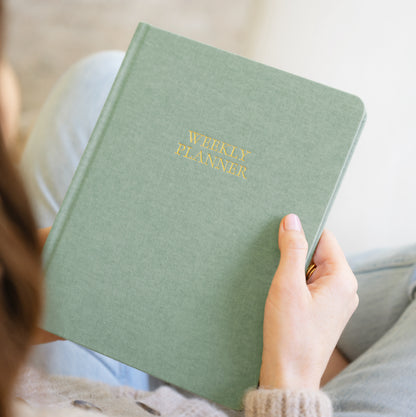 Weekly Sage Planner in Hands
