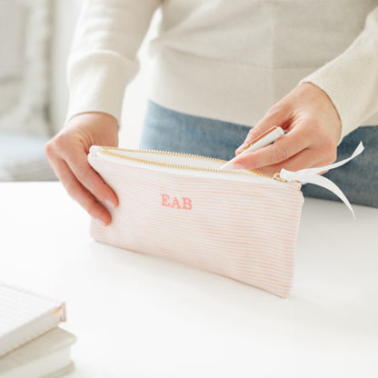 Pink stripe pencil pouch with 'EAB' initials in pink embroidery