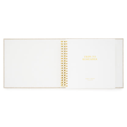 cover page of the trips to remember spiral bound fabric keepsake book with foil stamped trips to remember in gold