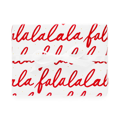 red falalalala gift wrap with white ribbon