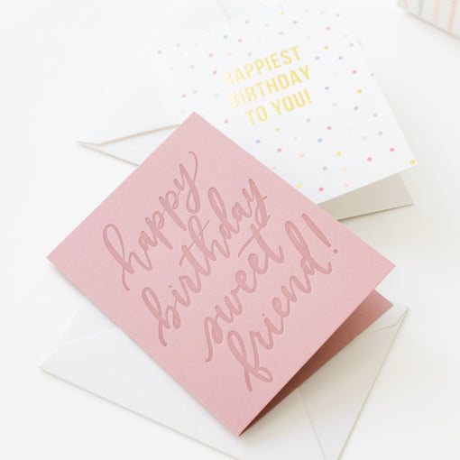 Pink birthday card with 'Happy Birthday Sweet Friend!' text on a white background