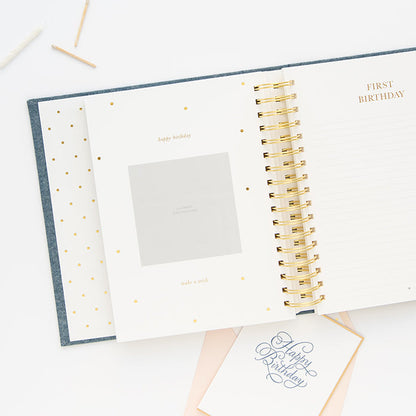 This is the interior of the baby book - the first birthday insert page. #color_chambray