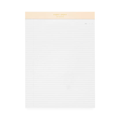 Legal pad with pink binding and gold foil logo